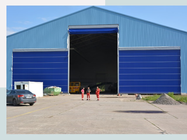 Ангарные ворота в Топки от СтальСтрой-Тпк по цене 608 руб.